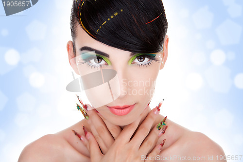 Image of fashion woman model with glamour  makeup,  fancy nails