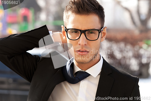 Image of business man with a flying tie