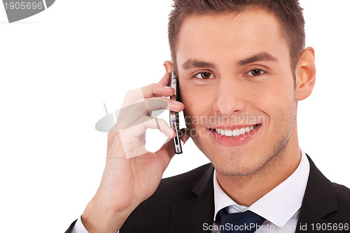 Image of business man making a phone call 