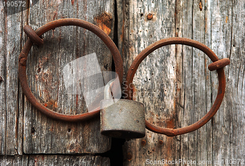 Image of Closed gate with a lock