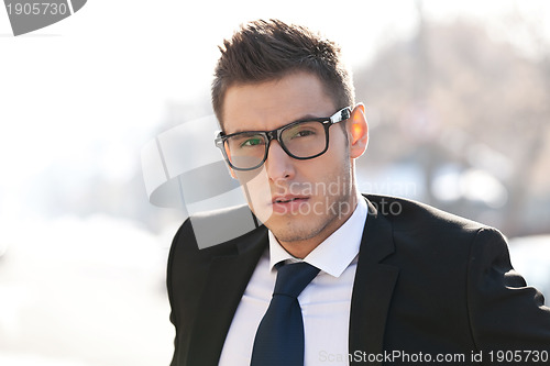 Image of executive wearing glasses