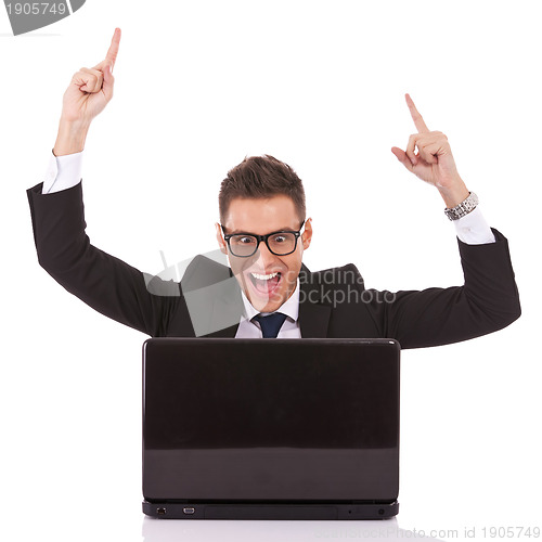 Image of winning business man at work