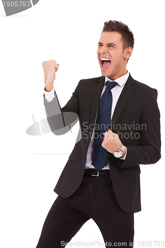 Image of young business man enjoying success