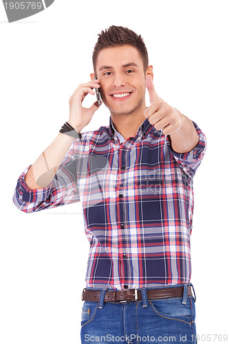 Image of Man With Thumbs Up on the phone