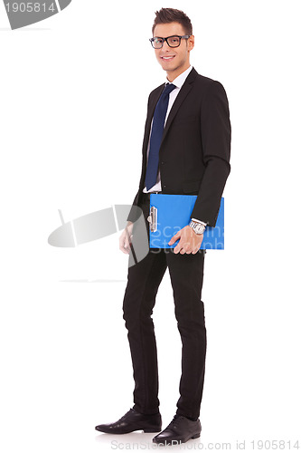 Image of young business man with a blue clipboard