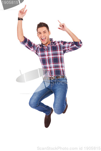 Image of Handsome man jumping 