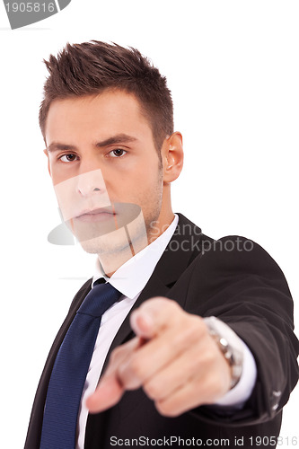 Image of Young business man acusing