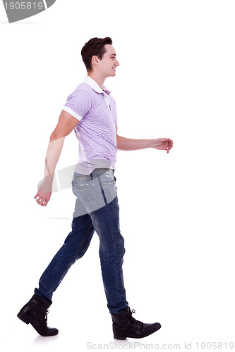 Image of side view of a fashion man walking forward