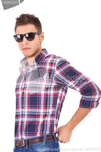 Image of young man wearing sunglasses