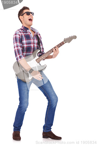 Image of screaming guitarist playing