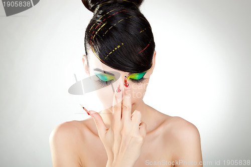 Image of young woman with great colorful makeup