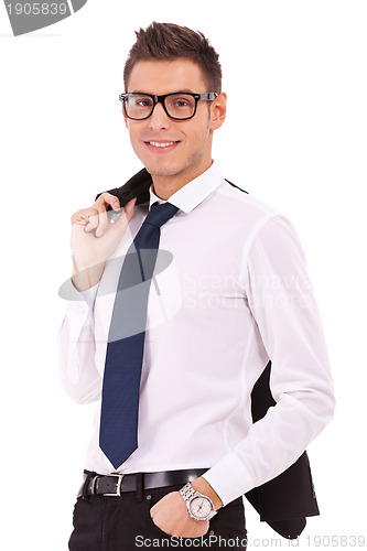 Image of business man holding coat over shoulders