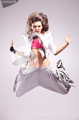 Image of woman dancer screaming and jumping