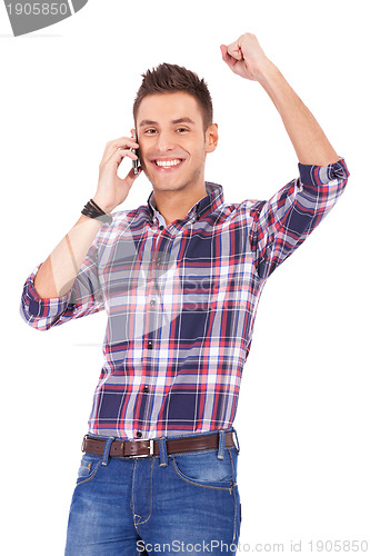 Image of  happy young man receiving great news