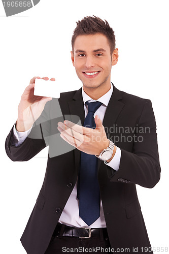 Image of business man presenting a blank card or note