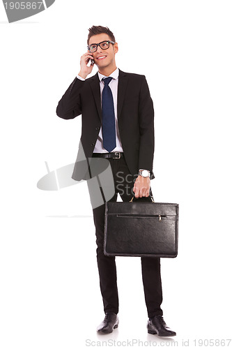 Image of business man talking on a  mobile phone