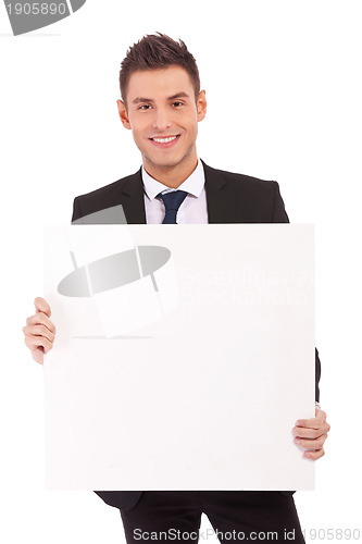Image of  business man with blank board 