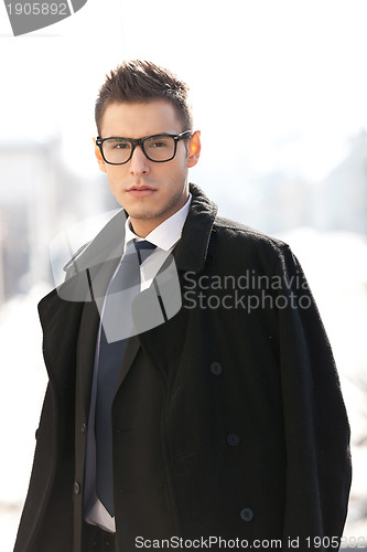 Image of Businessman wearing suit 