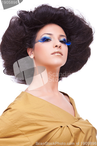 Image of young women with a beautiful make-up and hairstyle