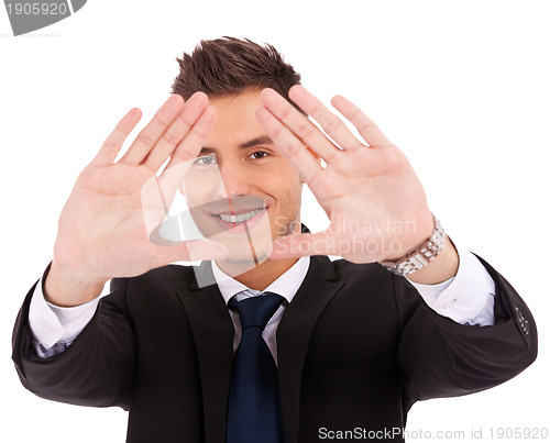 Image of business man making a hand frame