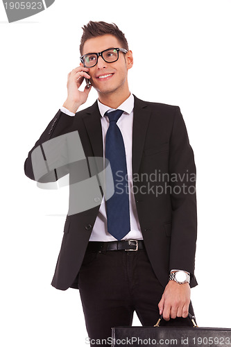 Image of business man speaking on the phone
