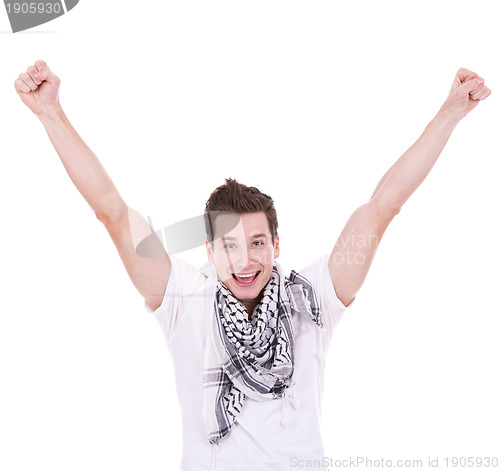 Image of Casual man looking very happy with his arms up