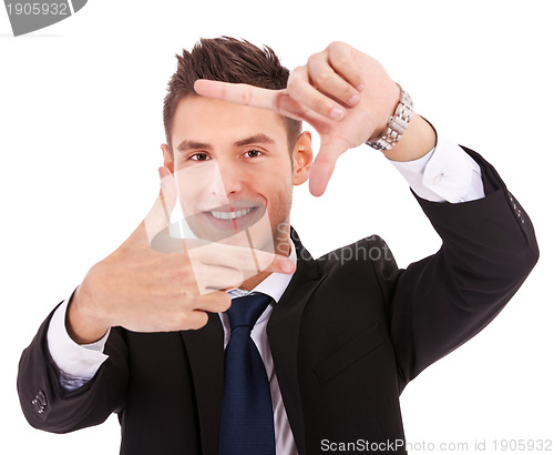 Image of executive making frame with his hands 
