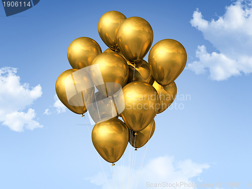 Image of gold balloons on a blue sky