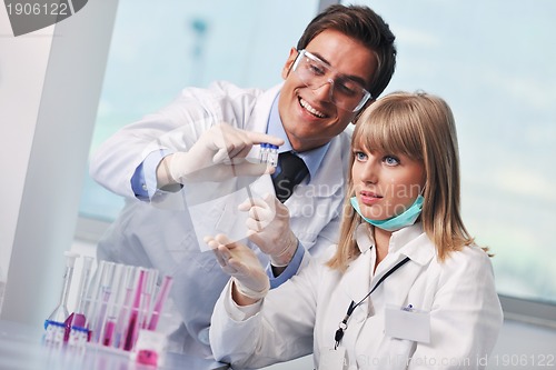 Image of science people in bright lab