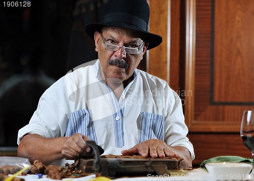 Image of man making luxury handmade cuban cigare