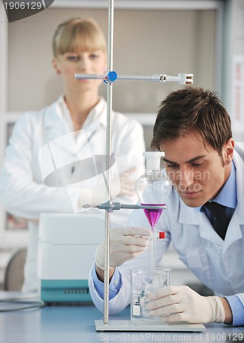 Image of science people in bright lab