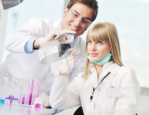 Image of science people in bright lab