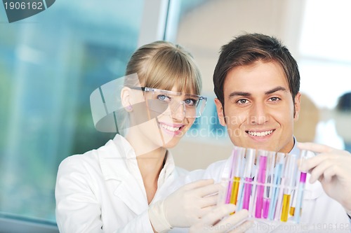 Image of science people in bright lab
