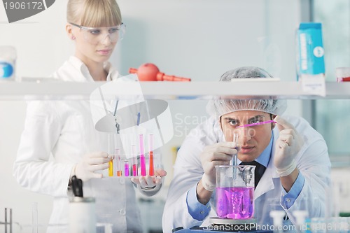 Image of science people in bright lab