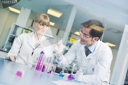 Image of science people in bright lab