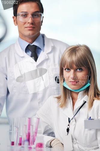 Image of science people in bright lab
