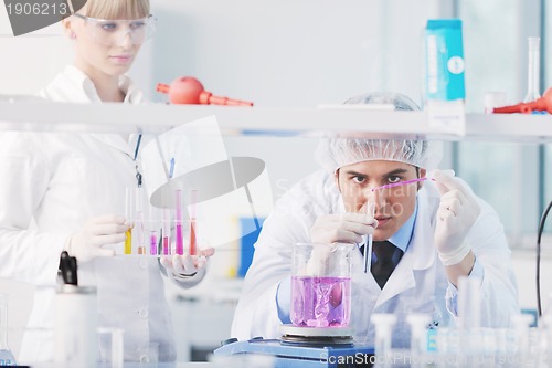 Image of science people in bright lab