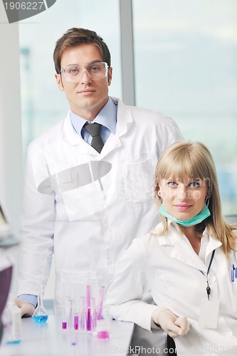 Image of science people in bright lab