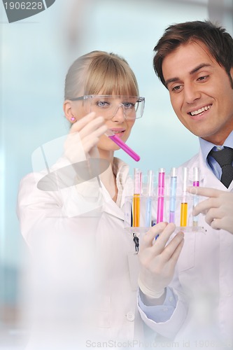 Image of science people in bright lab