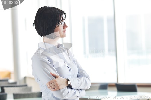 Image of young business woman on meeting