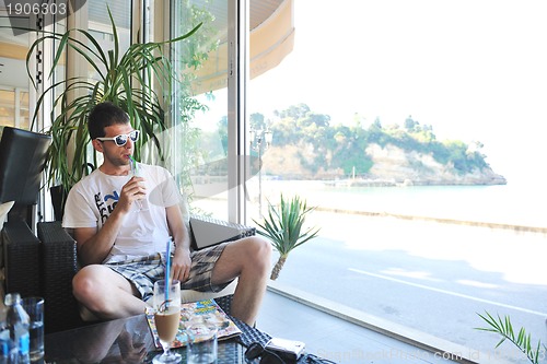 Image of man drink fresh morning coffee