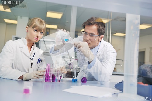 Image of science people in bright lab