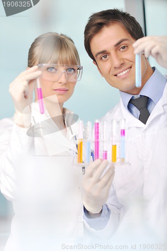 Image of science people in bright lab