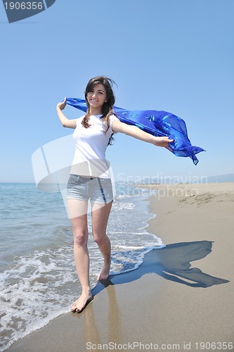 Image of young woman relax  on beach