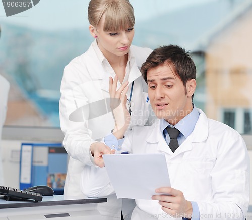Image of science people in bright lab