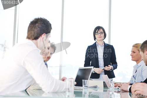 Image of group of business people at meeting