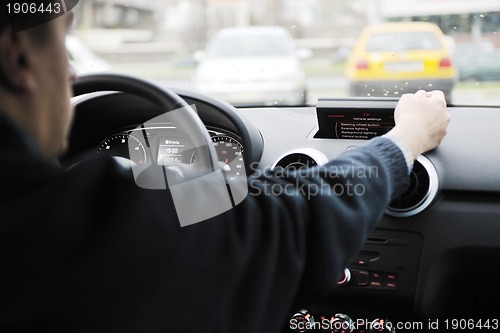 Image of man using car navigation