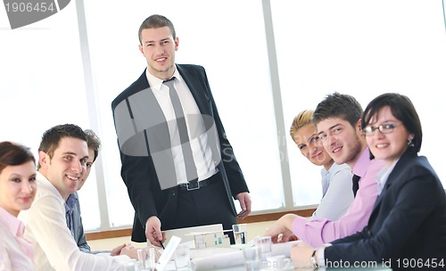 Image of group of business people at meeting