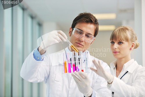 Image of science people in bright lab