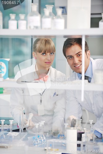 Image of science people in bright lab